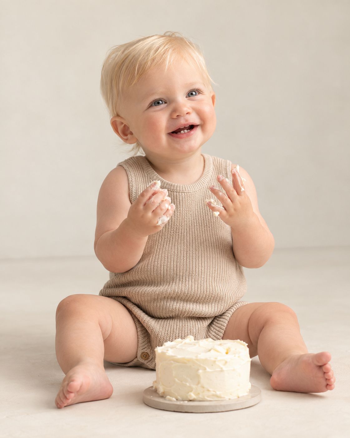 smiling with icing on hands