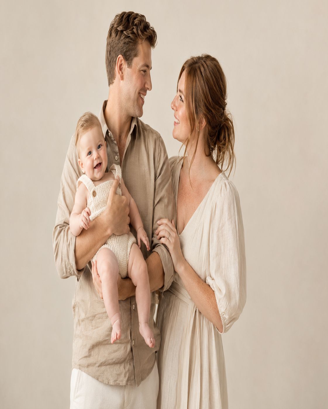 parents baby shared smiles