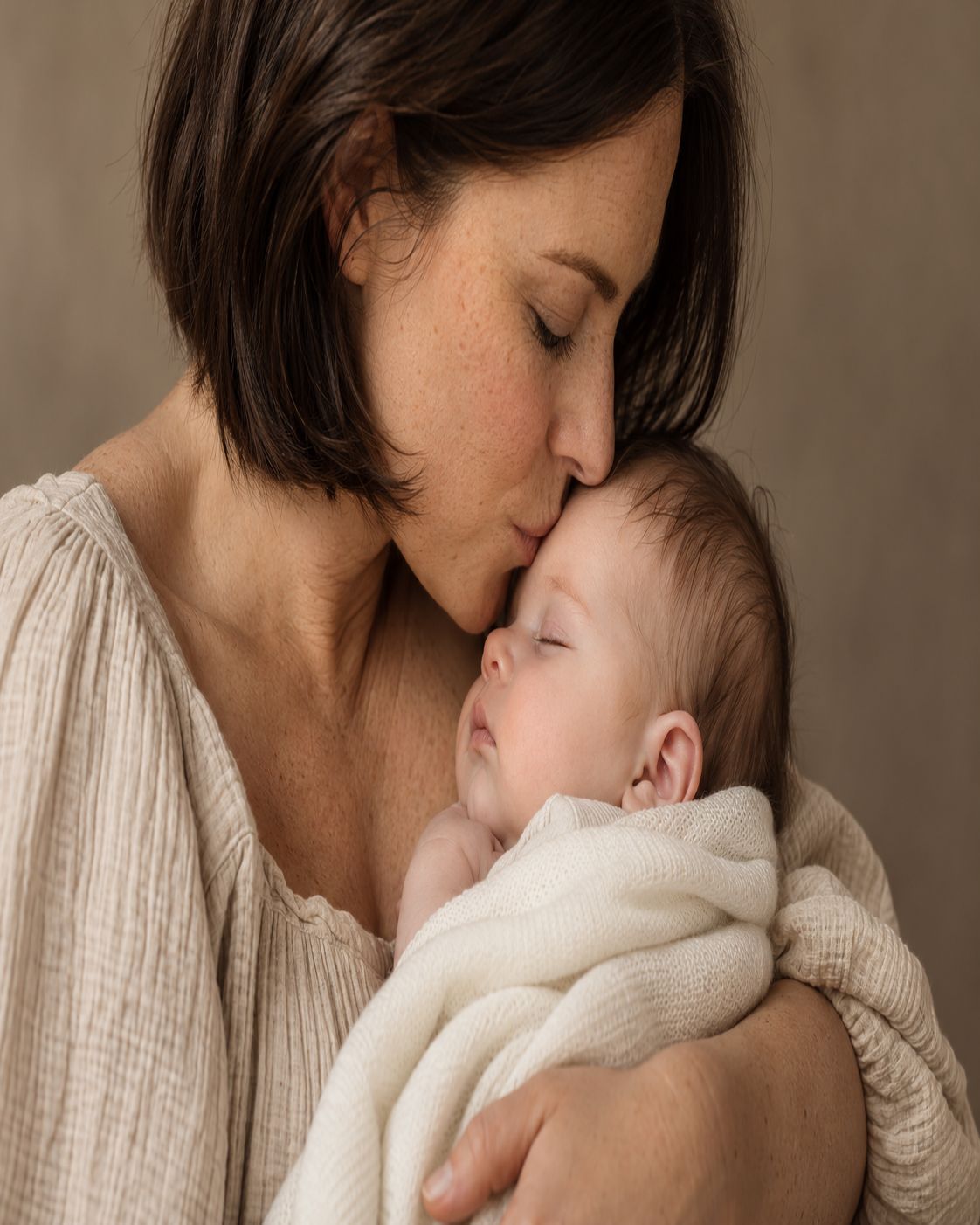 mother kiss forehead
