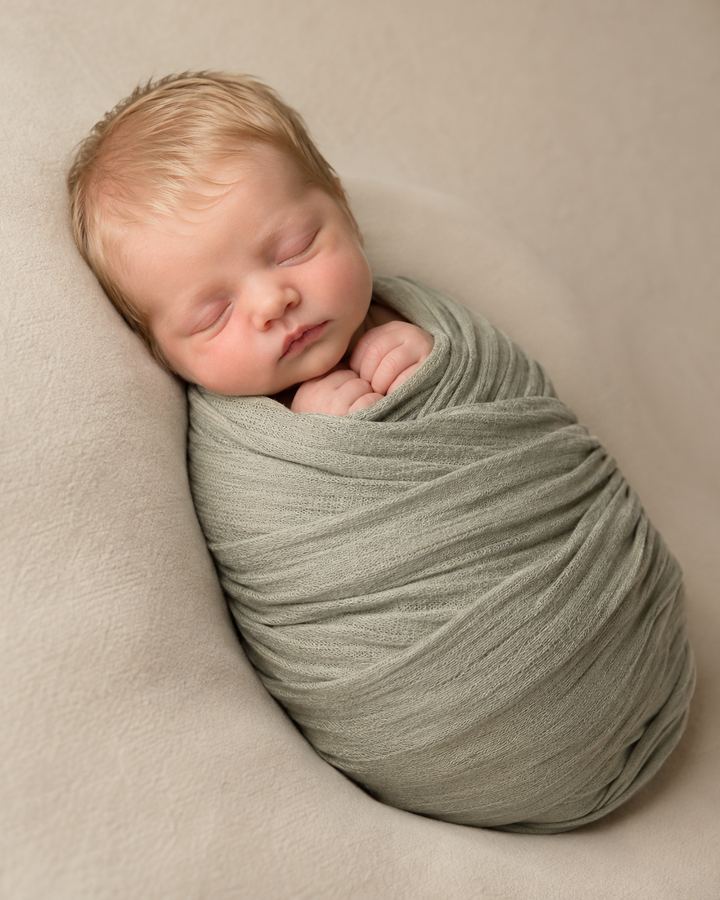 Newborn: muted sage swaddle